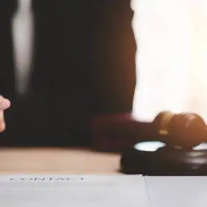 businessman holding a pen and review handling of documents and business agreements ,Signing a form ,signing a business contract approval ,contract documents confirmation or warranty certificate